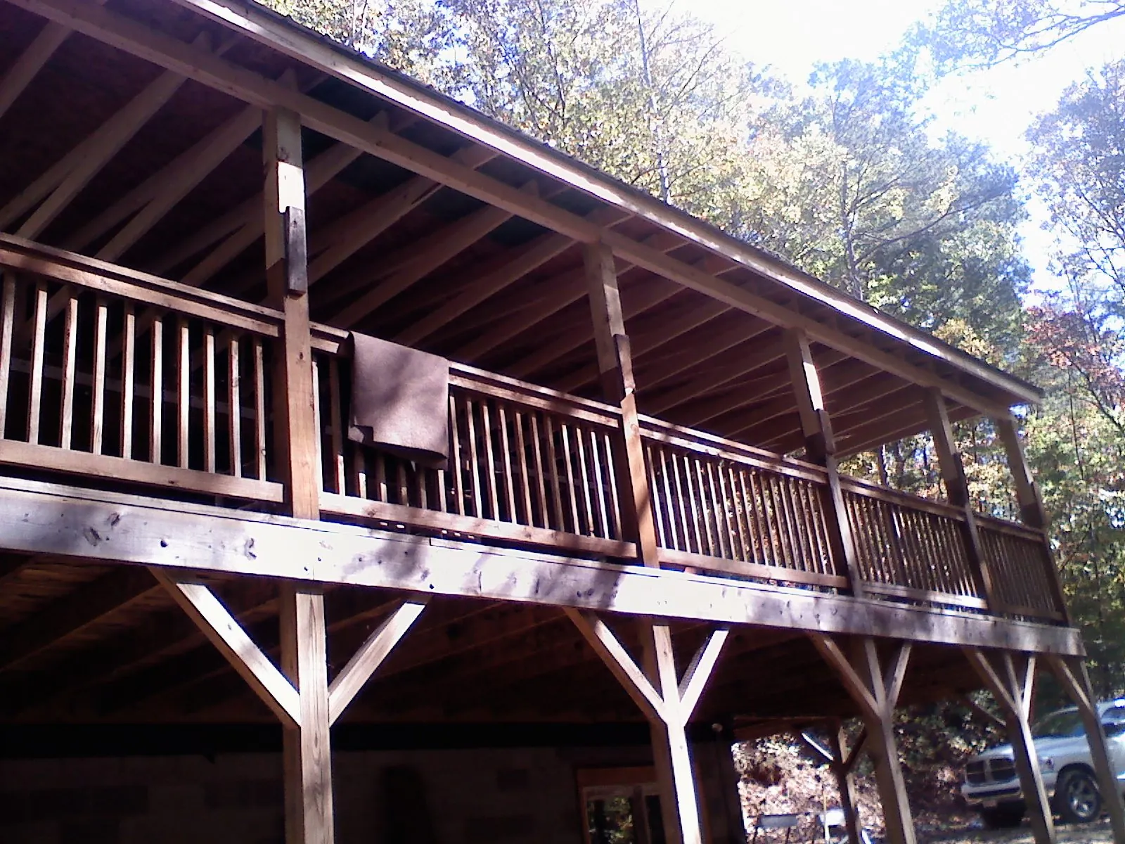 Timber framing under a new elevated porch and deck — Roof Leak Repair in Hudsonville by Roofing Brothers